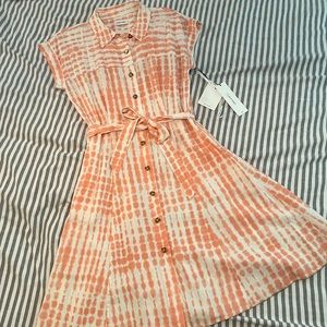 Peach and white colored button down dress